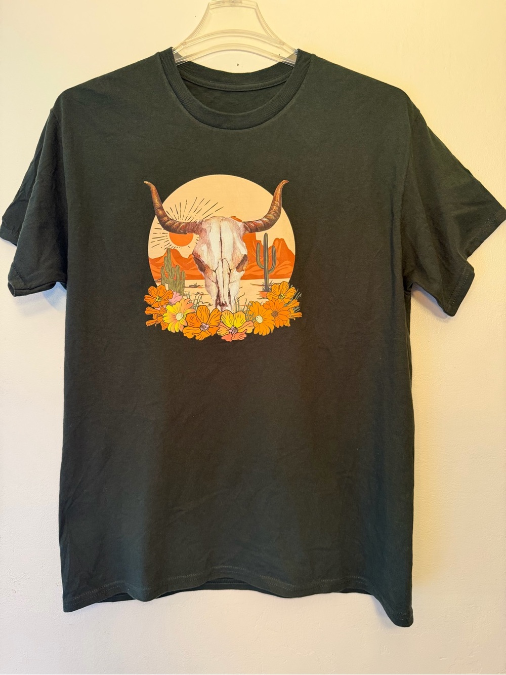 Woman’s Green Graphic Tee with Western Skull and Desert Floral Print